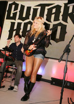 Gratuitous Pix of Blonde 'Sensation' Playing Guitar Hero 5 News image